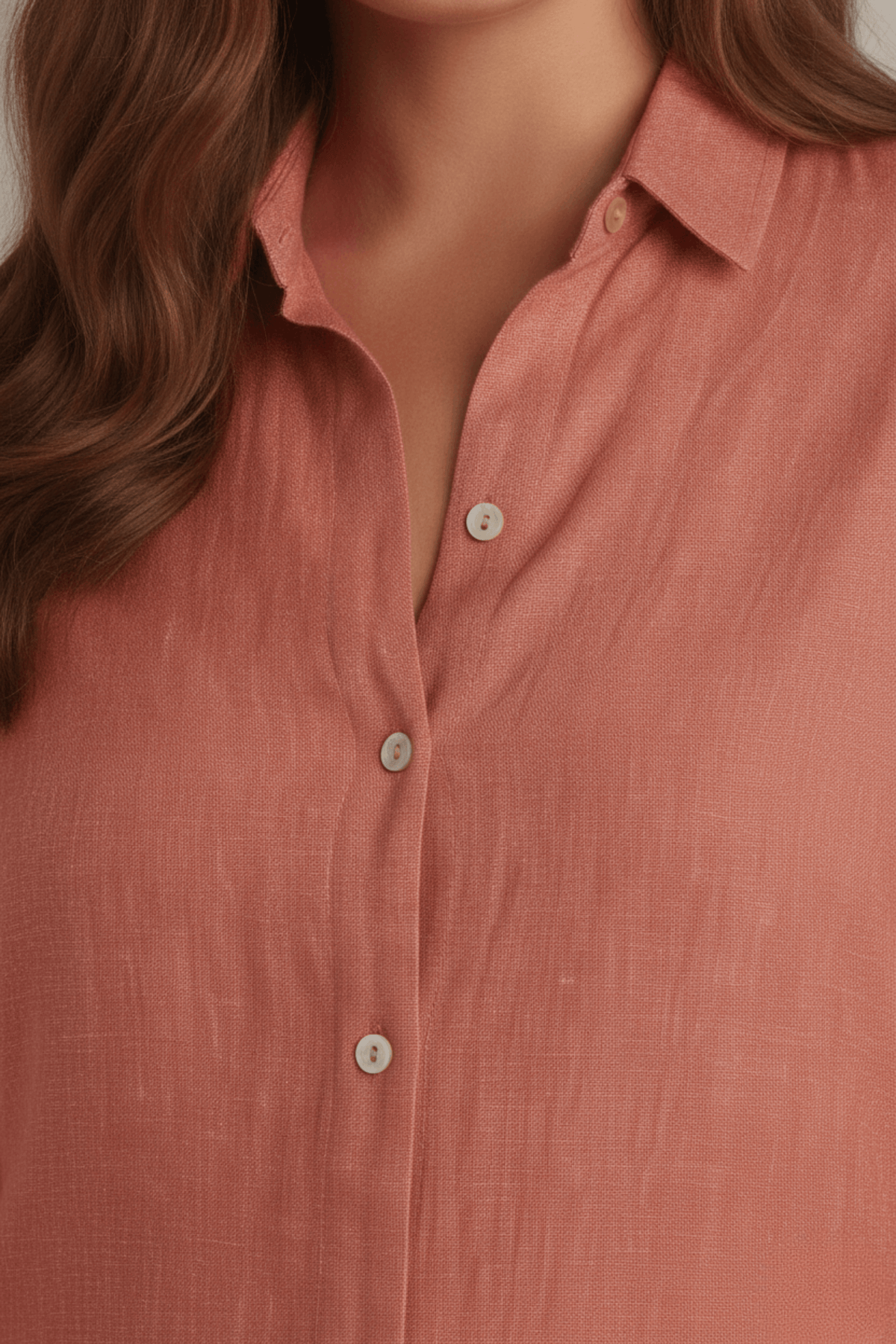 Close-up texture of Rosewood pink bamboo-hemp fabric and pocket detail on Koye sleepwear. #color_Rosewood