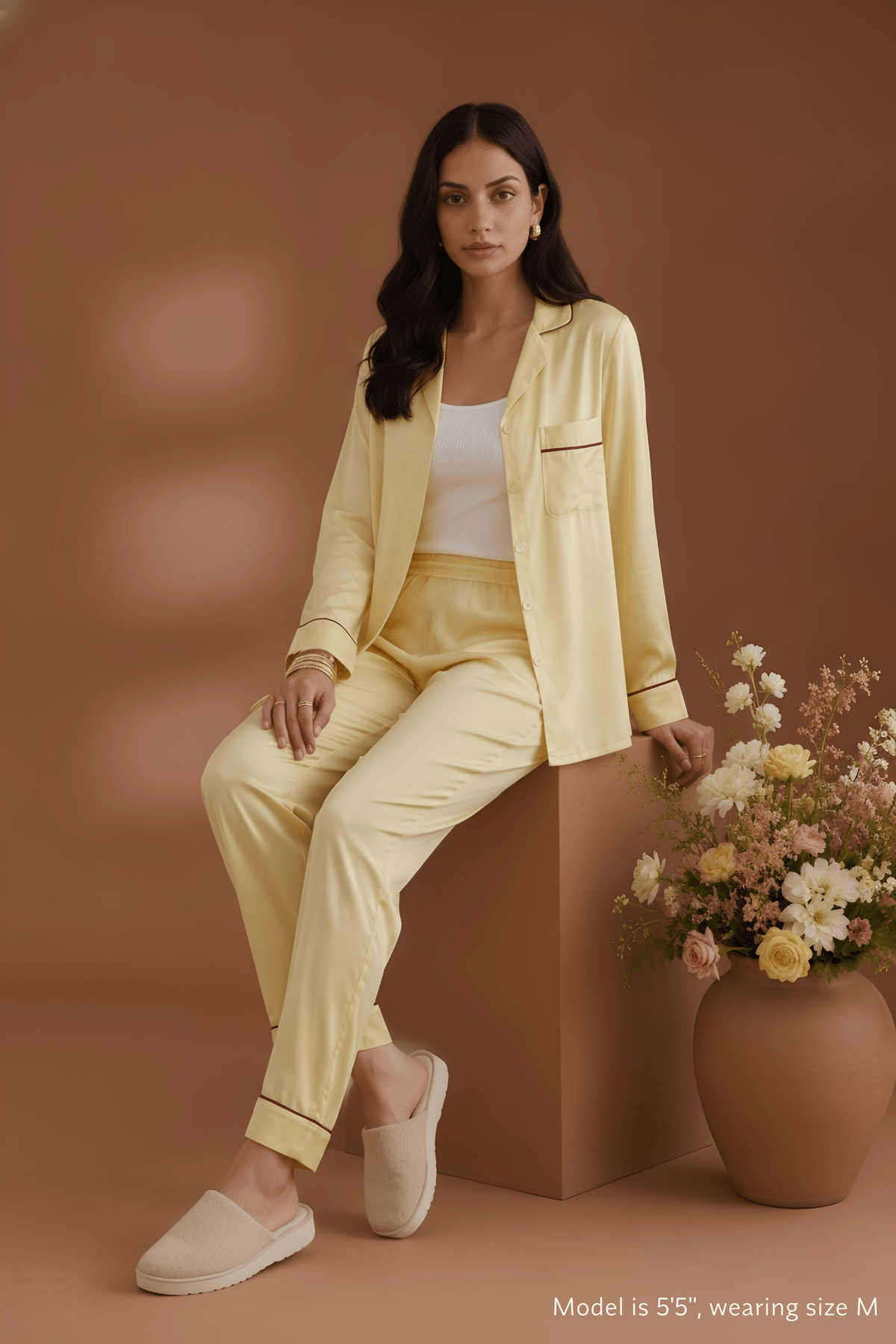 cover of Koye Pause Pajama Set in butter yellow satin with button-down shirt. #color_Butter Yellow