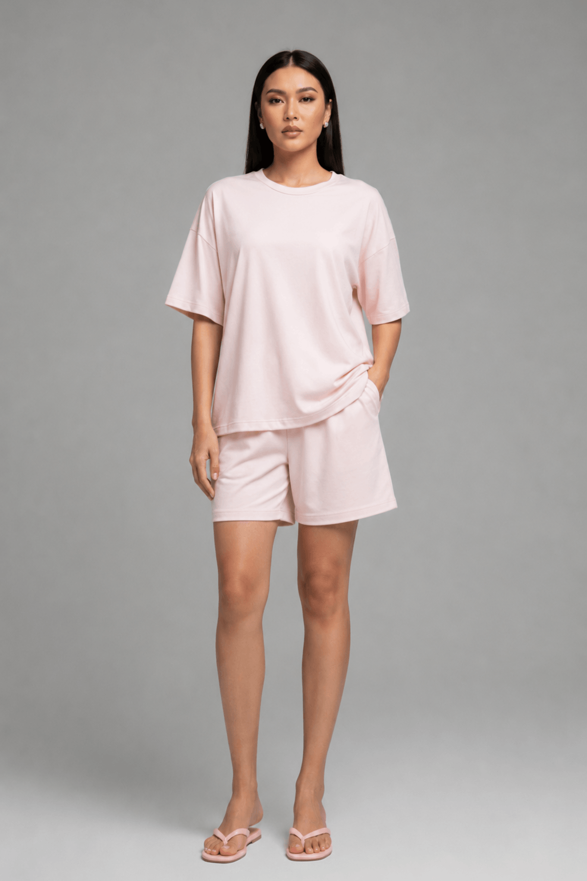 Front view of Koye women's pink relaxed fit t-shirt and matching shorts pajama set. #color_Blush Pink