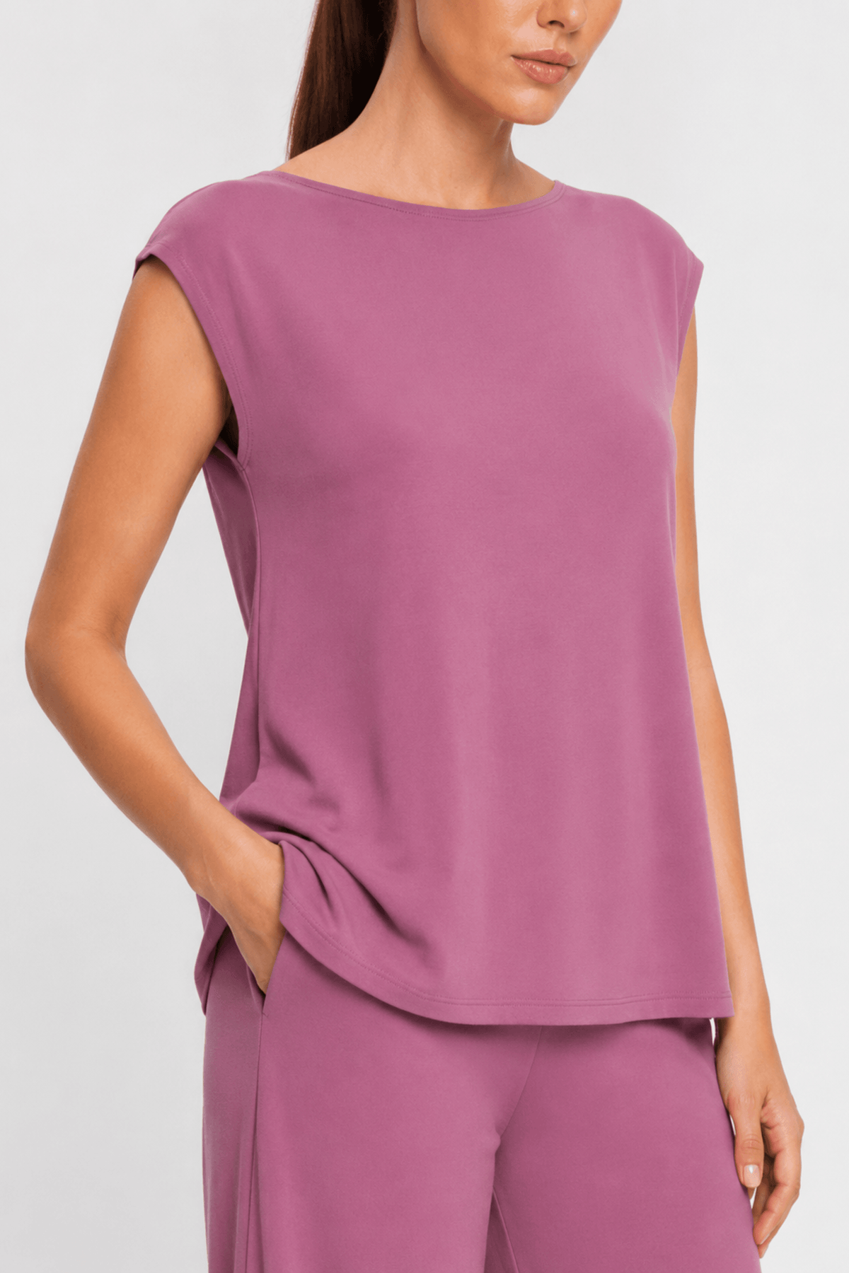Close-up of the smooth bamboo cotton fabric and pocket detail on the Koye Ease Lounge Set. #color_Mellow Mauve