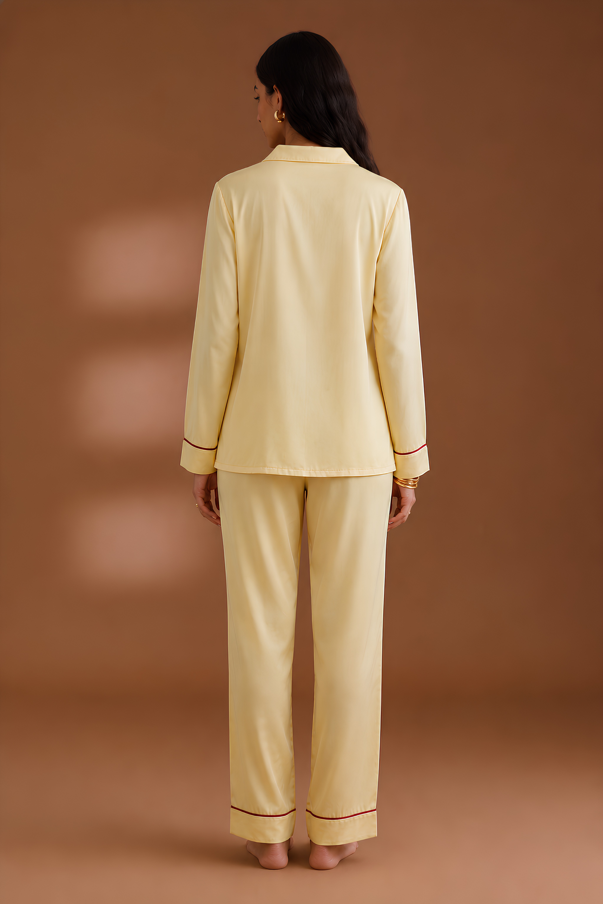 satin sleepwear set back profile showing fluid drape and relaxed fit. #color_Butter Yellow