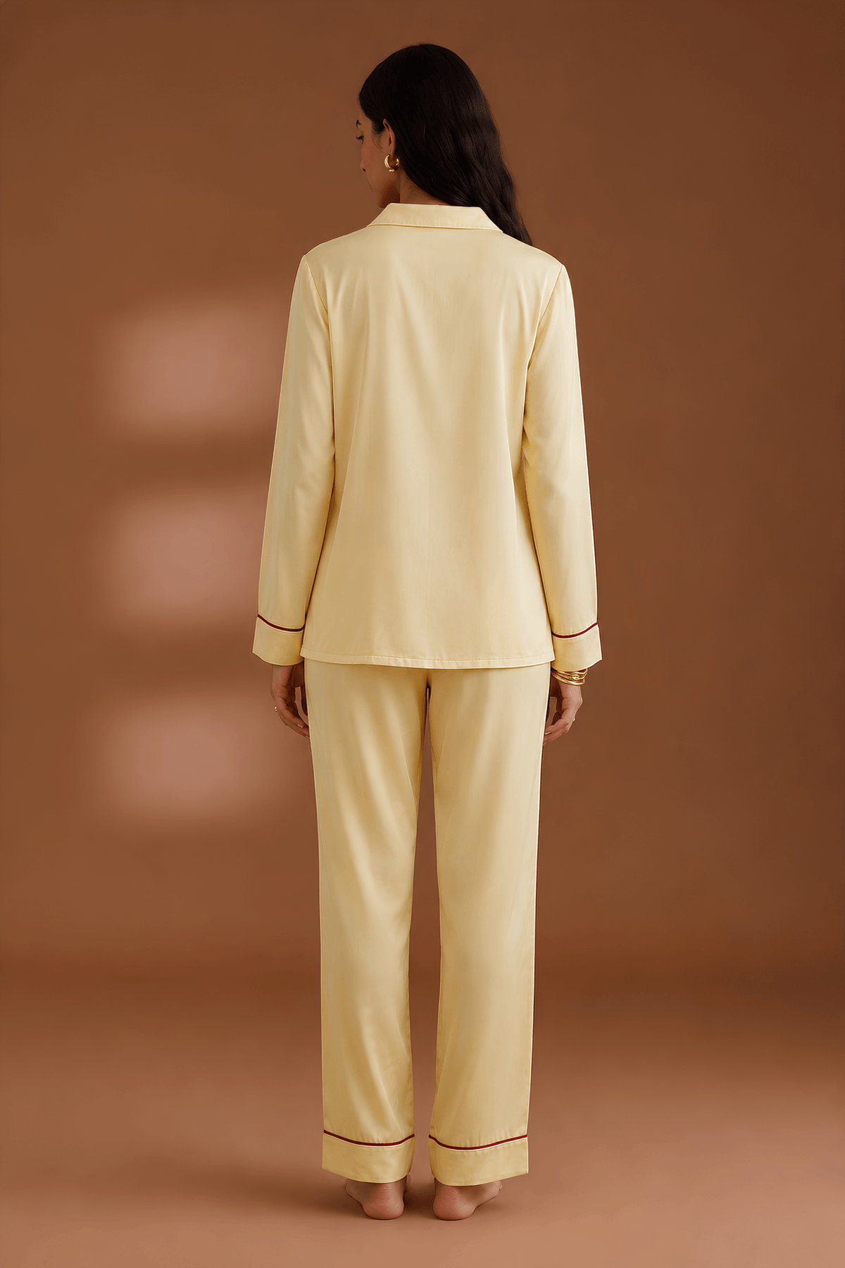satin sleepwear set back profile showing fluid drape and relaxed fit. #color_Butter Yellow