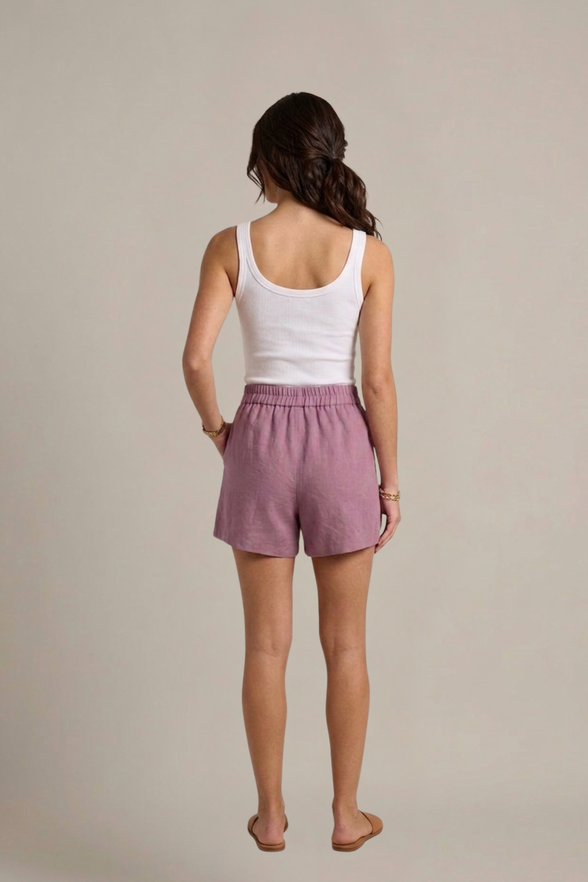 Back view of women's lilac Bamboo-Hemp shorts highlighting the above-the-knee drape. #color_Lilac
