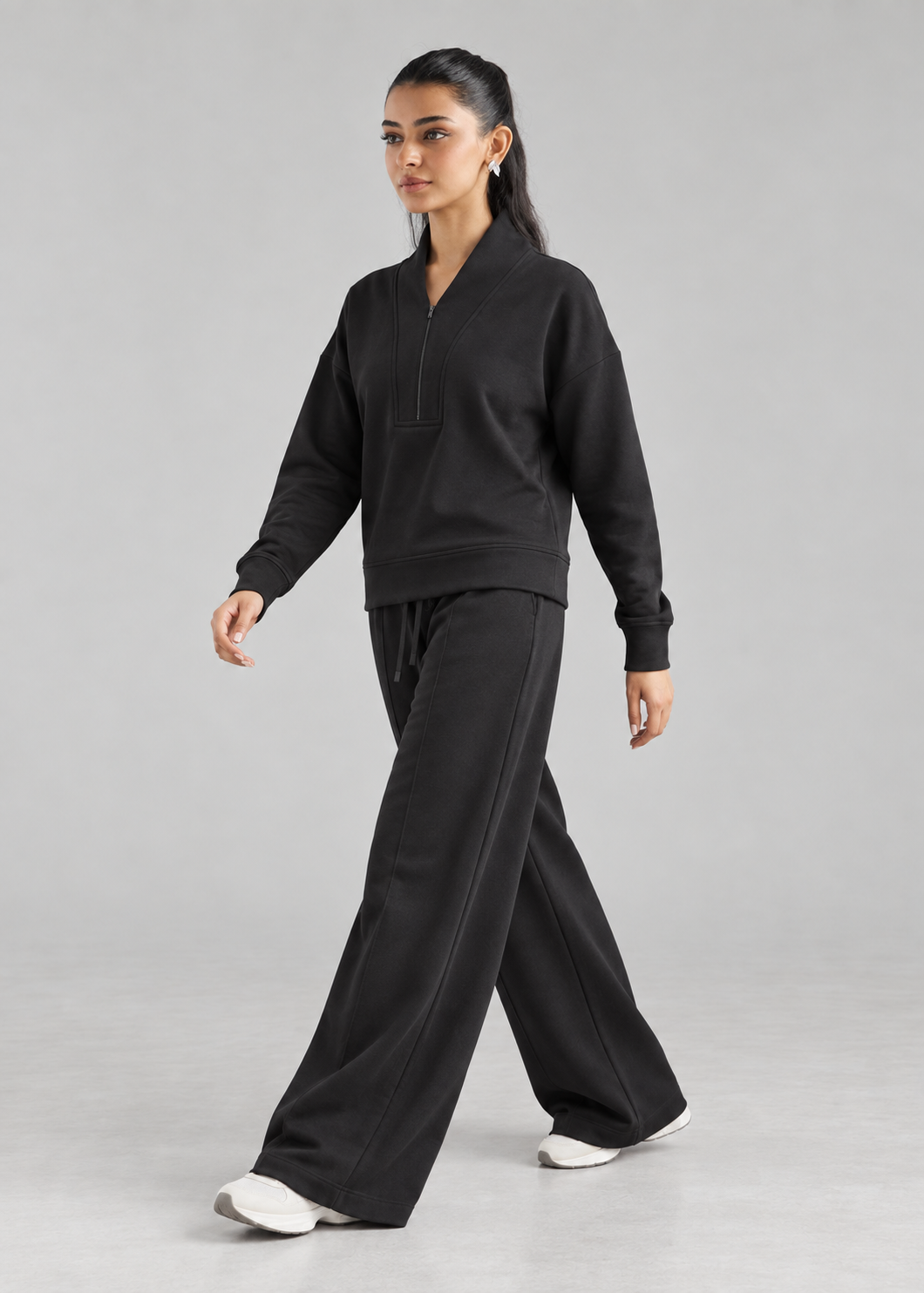 Retreat Fleece Bottom in Black - side walking view