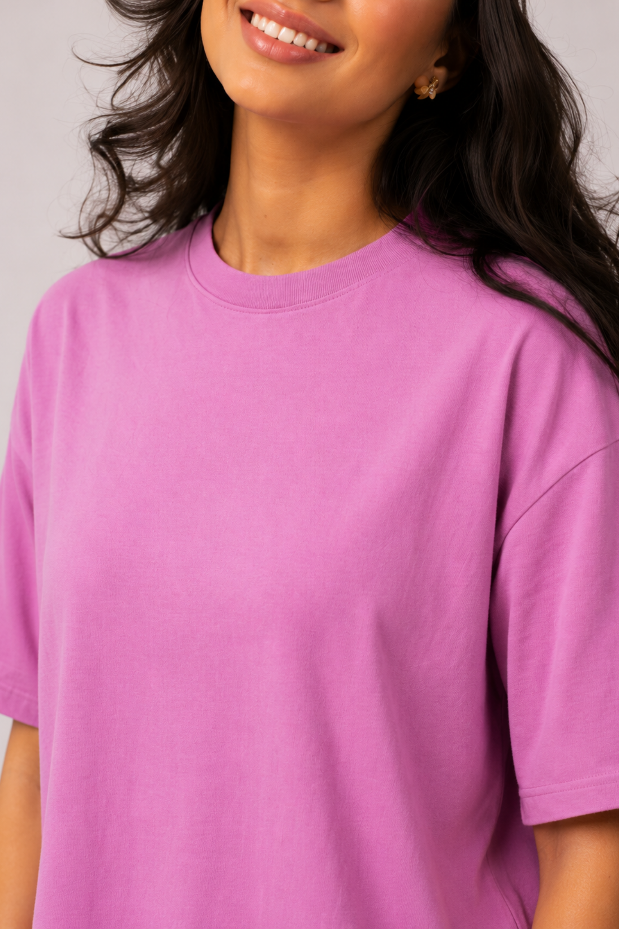 Close-up detail of the smooth, structured bamboo-cotton fabric and neckline on the back of the Snug Oversized Dress. #color_Mellow Mauve