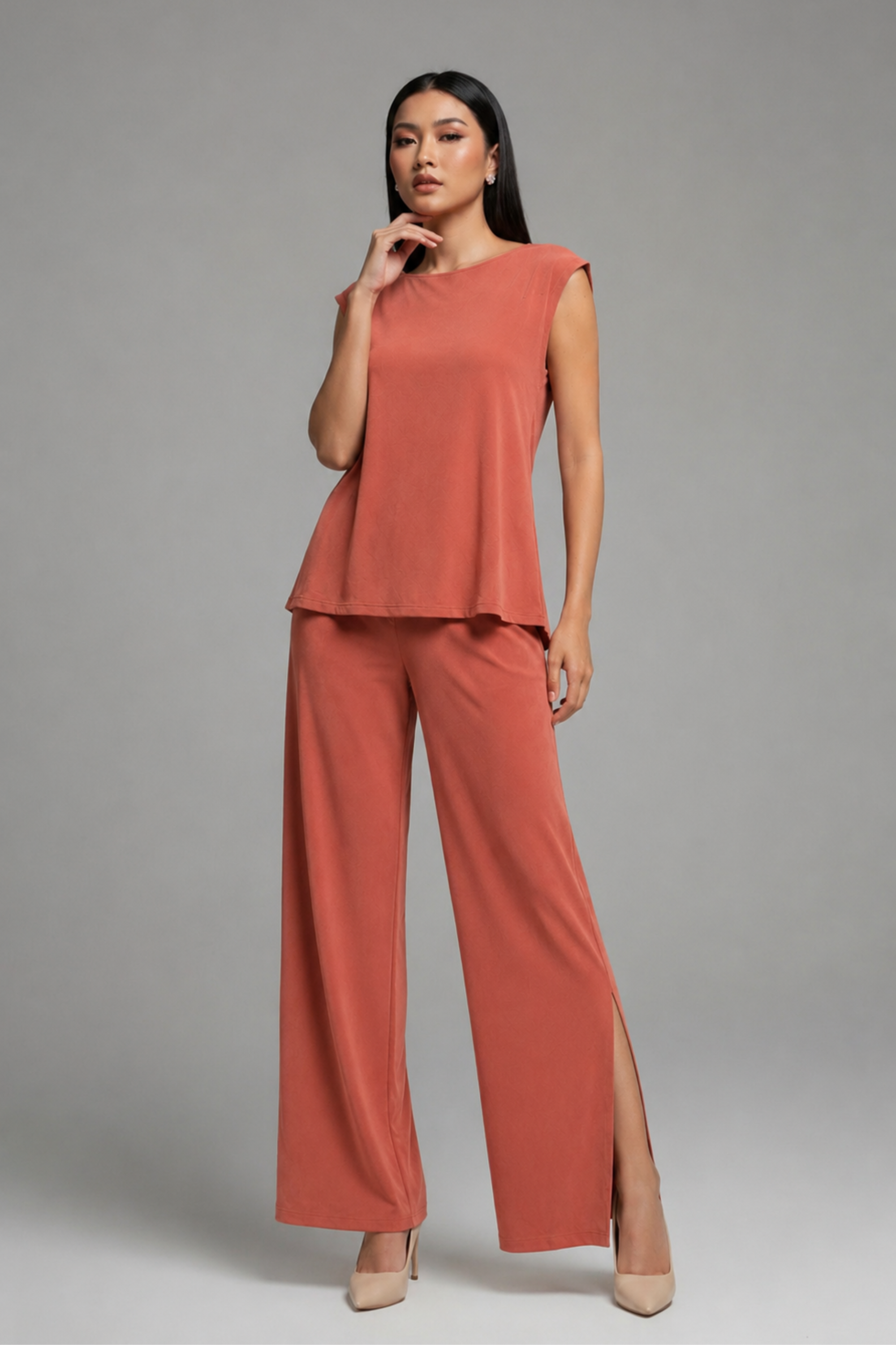 Front view of Koye Ease Lounge Set featuring a drop shoulder top and relaxed fit pyjamas. #color_Coral