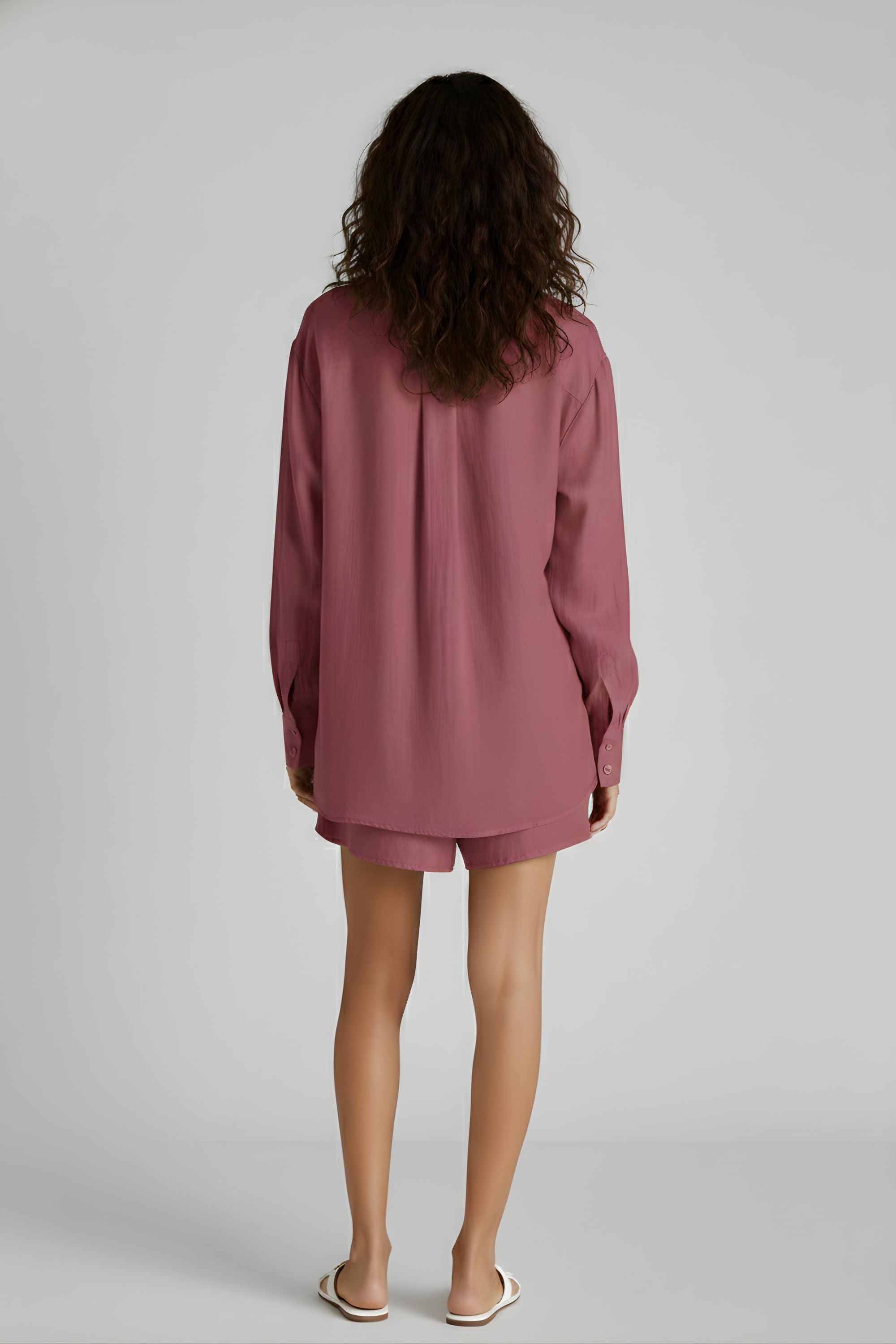 Back view of women's pink long-sleeve pajama shirt and matching shorts. #color_Rosewood