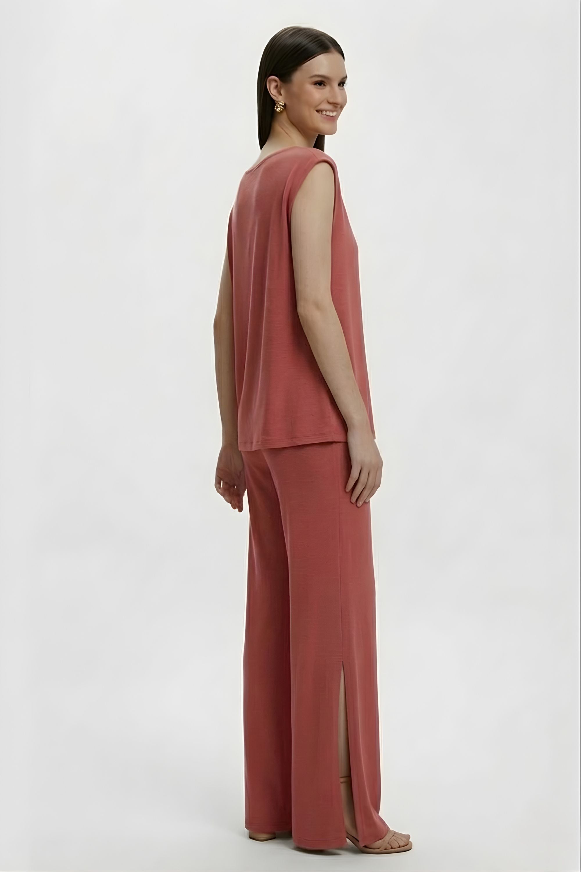 Side view of the Koye Ease Lounge Set showing the breathable bamboo cotton drape. #color_Coral